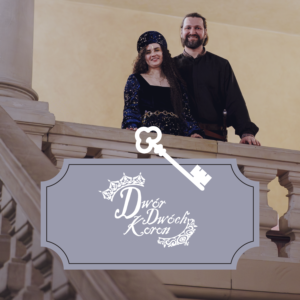 Two people in Renaissance costumes stand on a stone balcony, smiling at the camera, with an ornate logo and key graphic layered in the foreground.