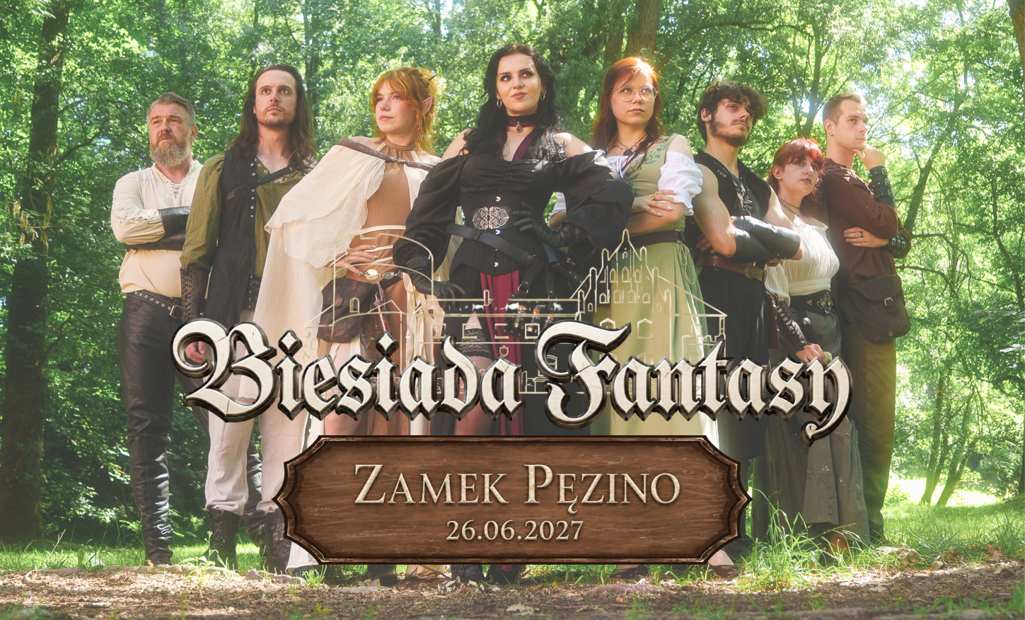 Group of adults in medieval fantasy costumes posing in a sunlit forest, with a wooden plaque showing 'Zamek Pęzino' and date in front.